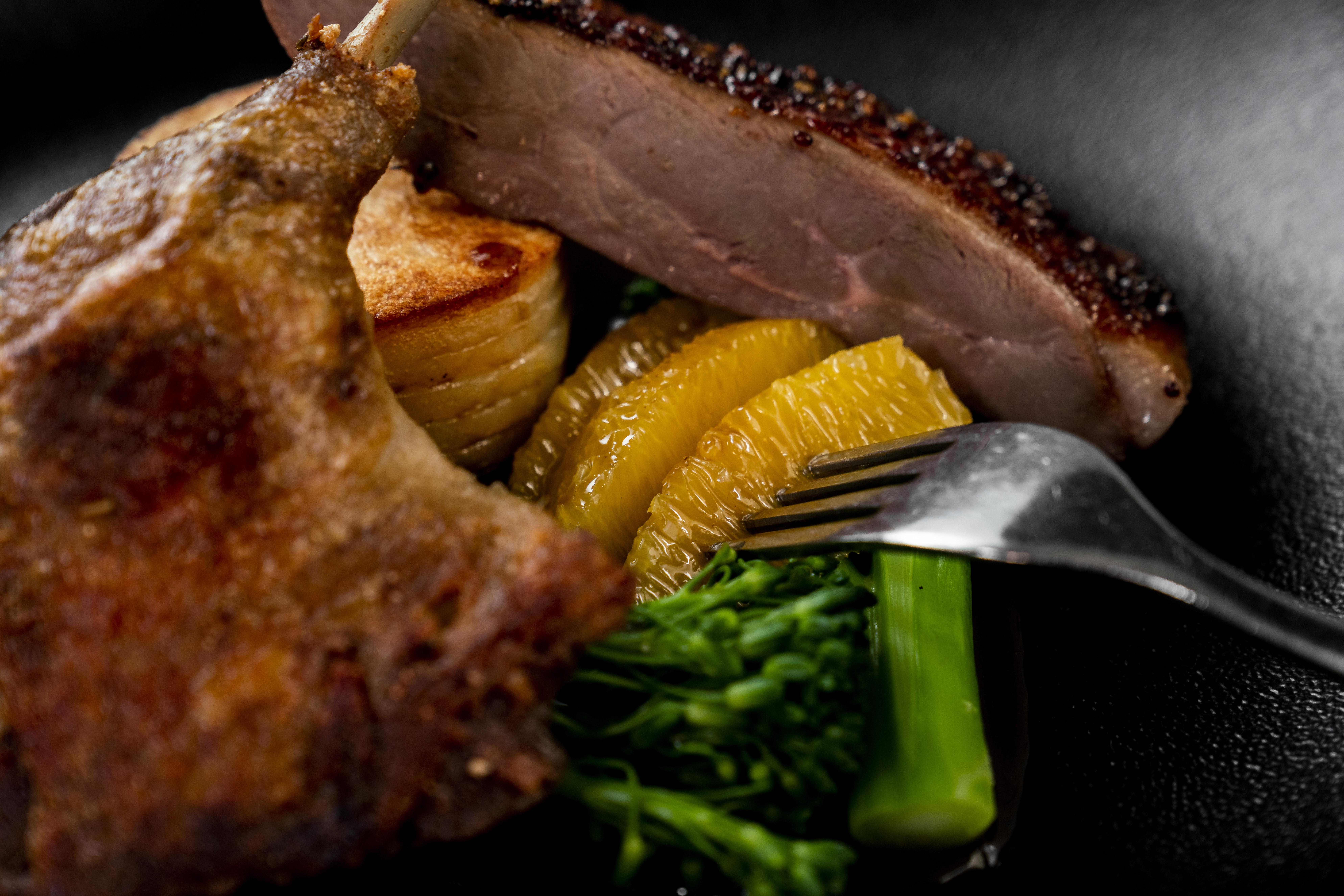 The Point Brisbane Hotel Exteriér fotografie A duck confit with orange and vegetables